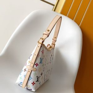 Alternative view of p680M27578 Celebrating the 130th anniversary of Louis Vuitton's Monogram pattern, this Carryall East West canvas bag illuminates the iconic motif with vibrant hues. A leather label inside commemorates the occasion, while an LV stud address tag and removable bow accessory add a playful touch. Dimensions: 36 × 19 × 0.5 cm